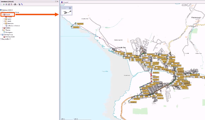 In the Explorer window, an asset group highlighted in red. A red arrow connects this group to the GeoPlan, indicating that it has been dragged and dropped to apply all items to the network.