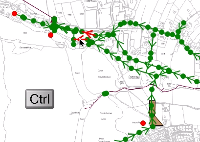 In the GeoPlan, multiple objects being selected, each highlighted in red, with an overlaid image of the CTRL key.
