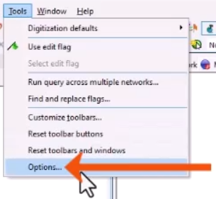 The Tools menu expanded, with Options being selected and called out with a red arrow.