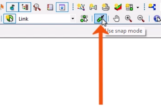 On the toolbar, use snap mode toggled on and called out with a red arrow.