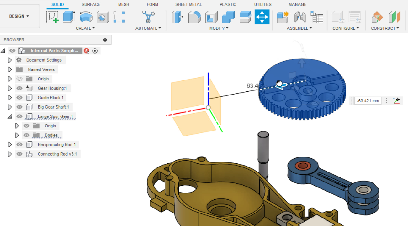 In the Fusion interface, on the canvas, a gear part being moved to show that the body moves independently of its origin.