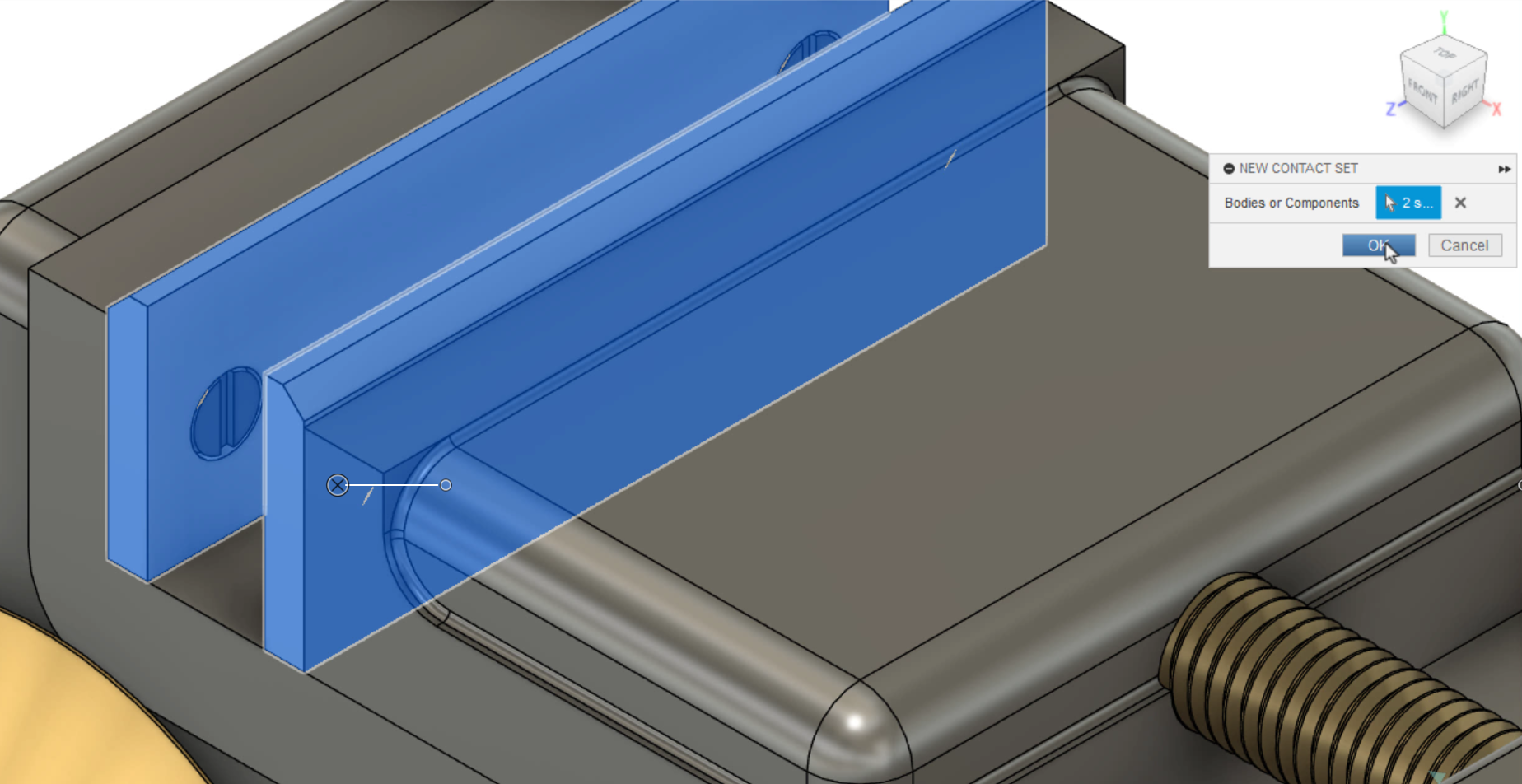 In a zoomed-in view of the vise assembly, the two jaw plates selected and highlighted, and in the New Contact Set dialog box, OK being selected.