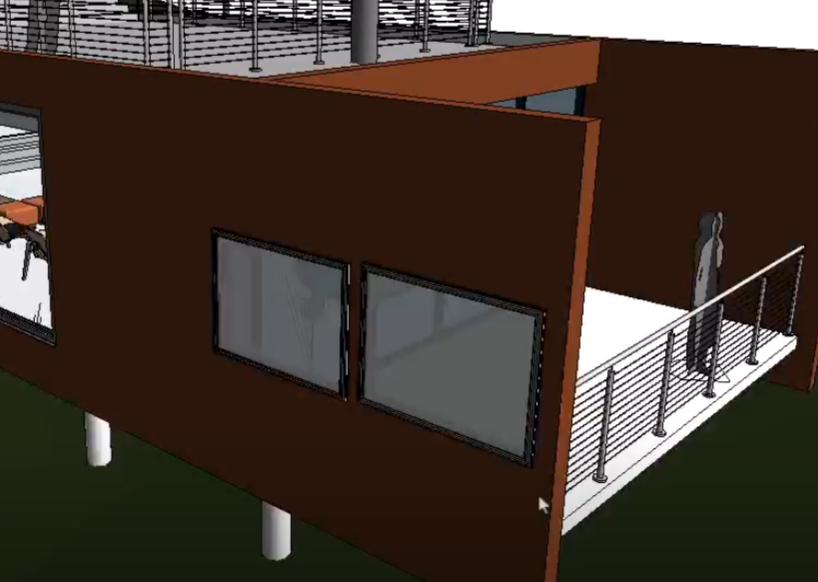 In the Revit model, intersecting geometry removed from the wall for the two windows.