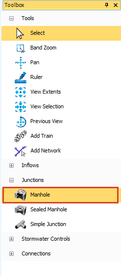 The Toolbox with Junctions expanded, and Manhole selected