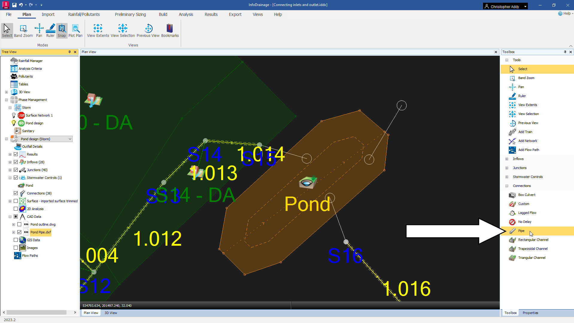 The entire InfoDrainage interface, with the pond centered in the Plan View and, in the Toolbox, the Pipe tool called out for selection.