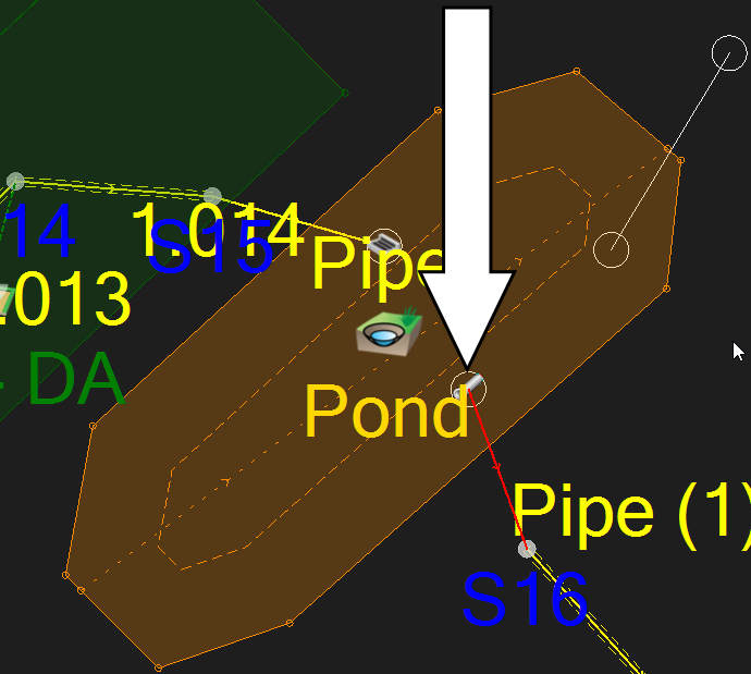 A very closeup view of the pond, with the callout pointing to the inside of the pond where the new outlet is now connected.