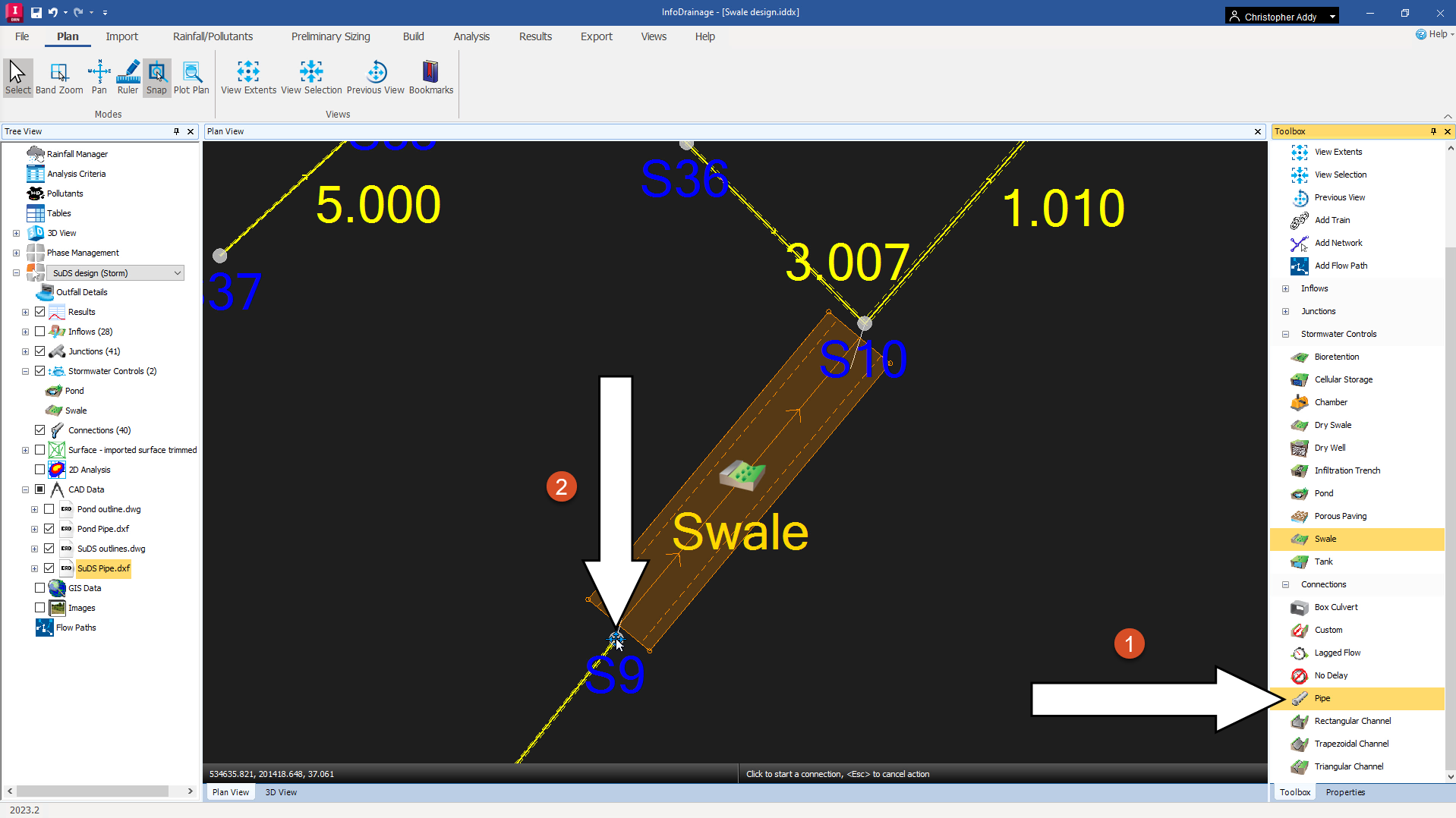 The InfoDrainage interface, with the Pipe object indicated as step 1, and the manhole object next to the swale indicated as step 2.