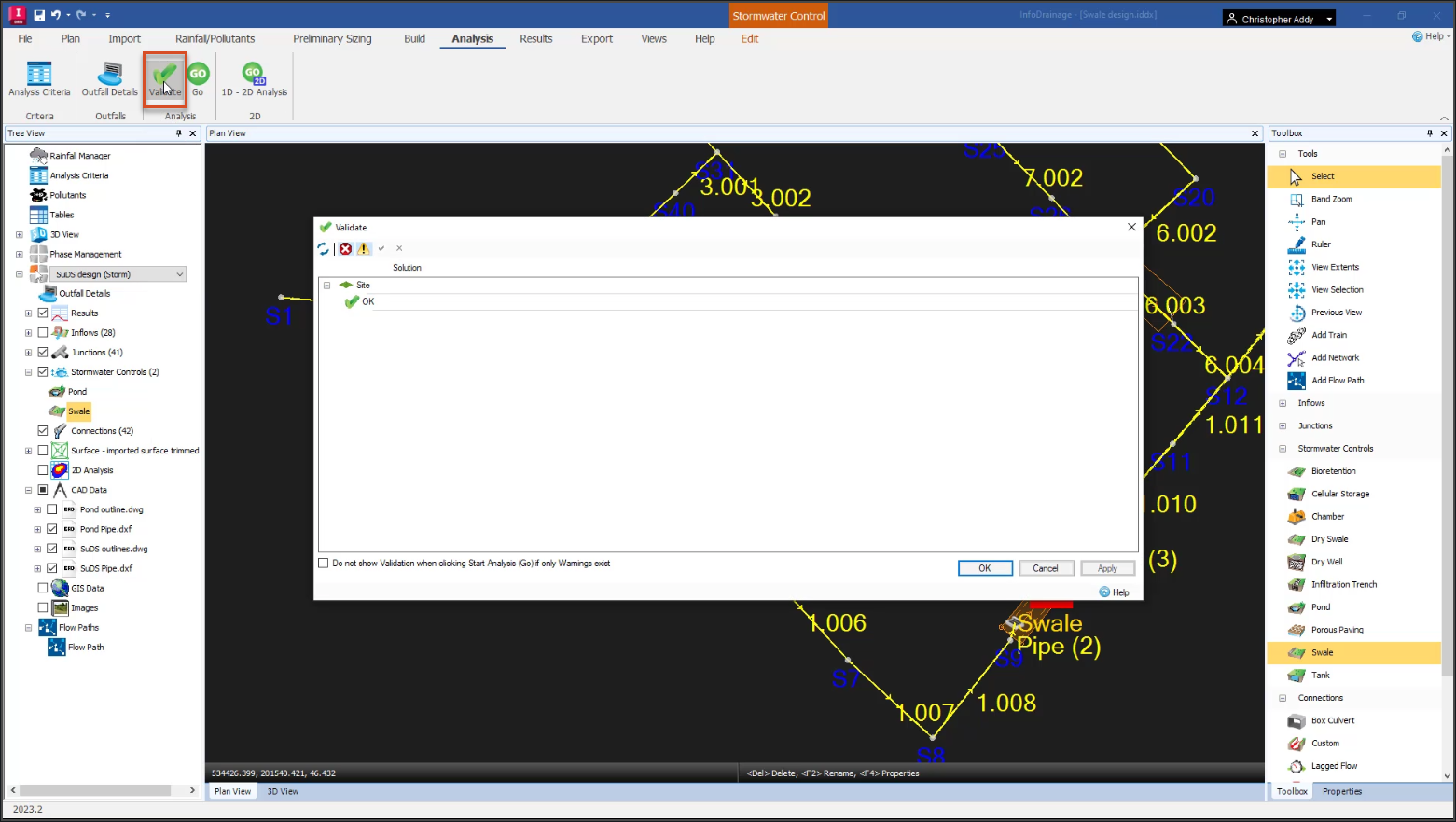 ifdr2023M07U02_Designing_a_Swale_040.png The InfoDrainage interface, with the Validate button highlighted in the ribbon and the Validate dialog box open and showing that there are no errors in the swale calculations.