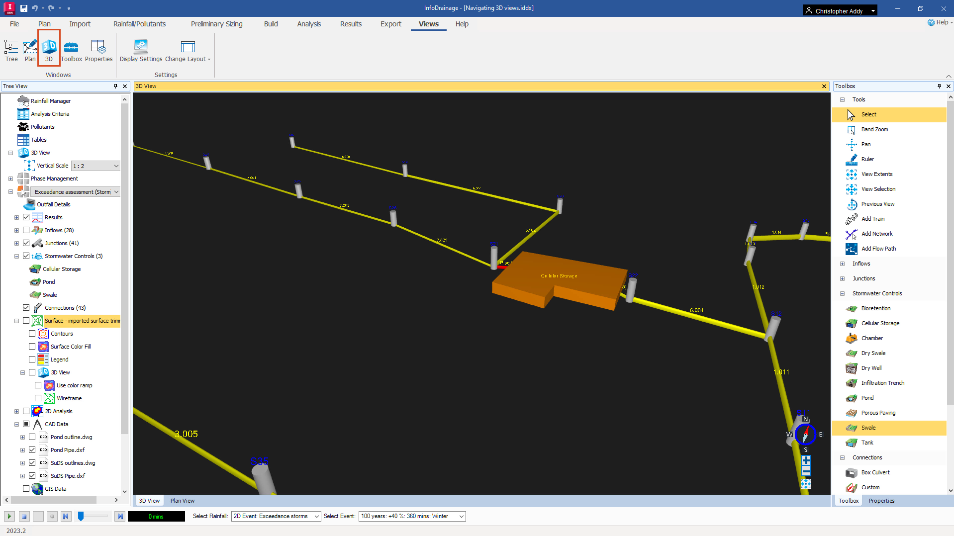 The InfoDrainage interface, with the Views tab of the ribbon active and the 3D button highlighted. The Plan View has changed to the 3D View, and a drainage model appears in three dimensions.