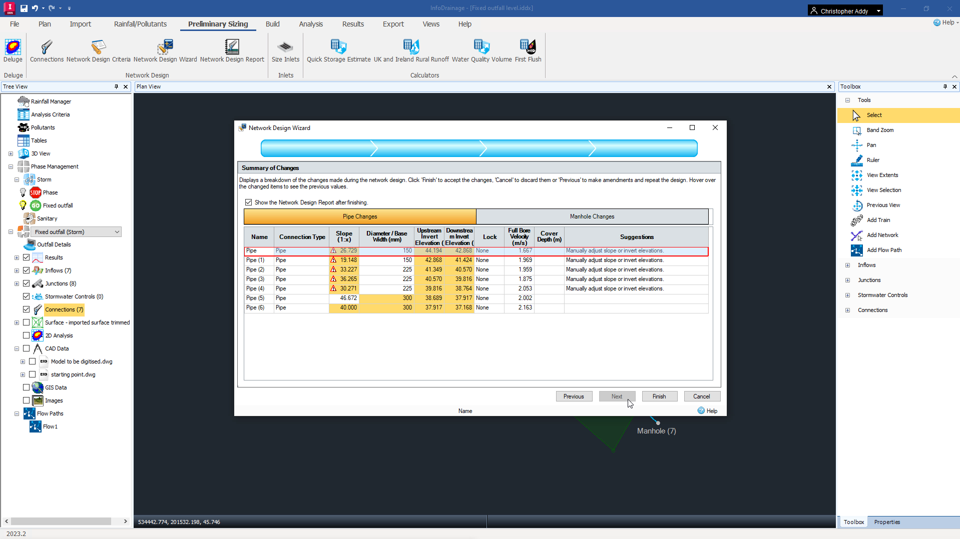 The InfoDrainage interface, with the Network Design Wizard open and the last page, the Summary of Changes, showing the pipes information with highlighted warnings for some of the pipes.