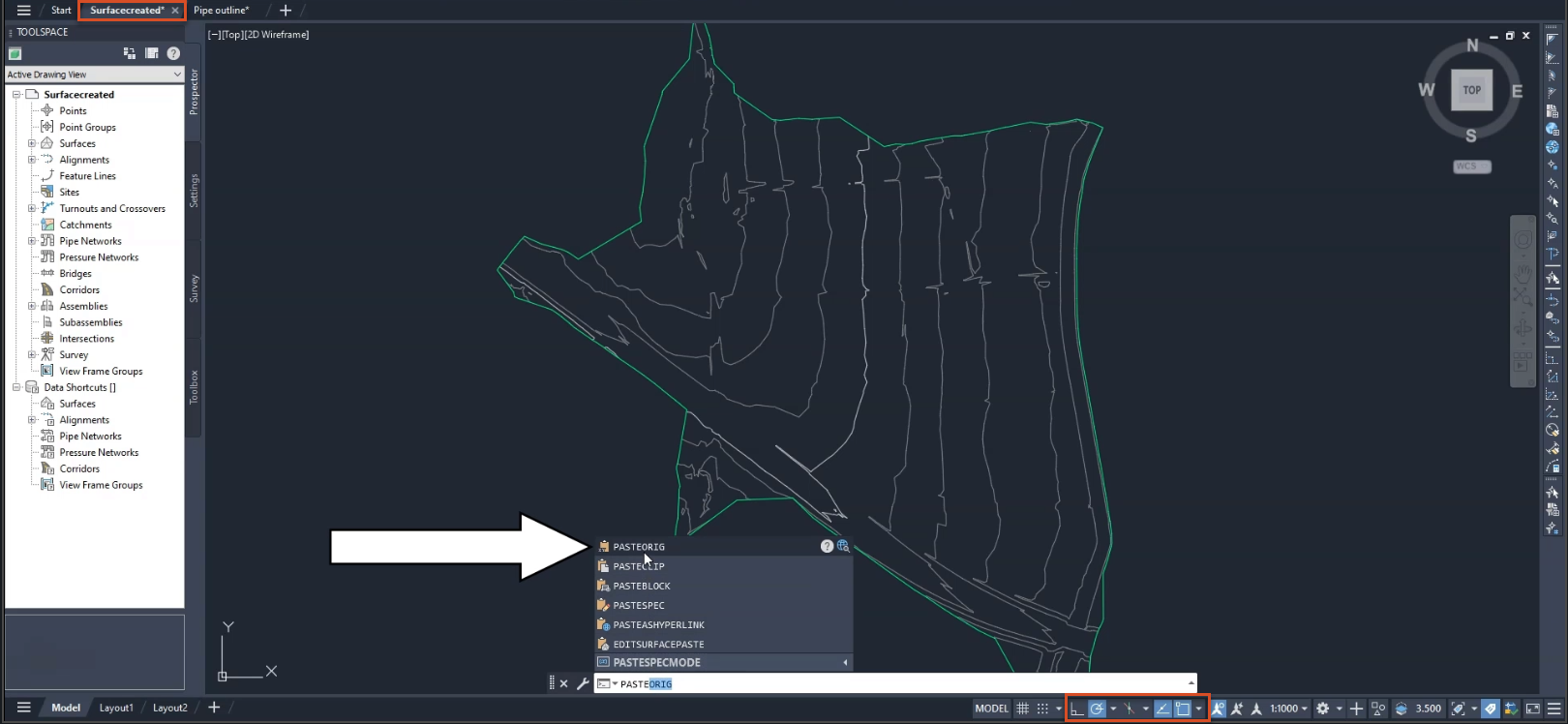 The copied pipes being pasted into Surfacecreated.dwg using PASTEORIG and the Snap tools turned on.