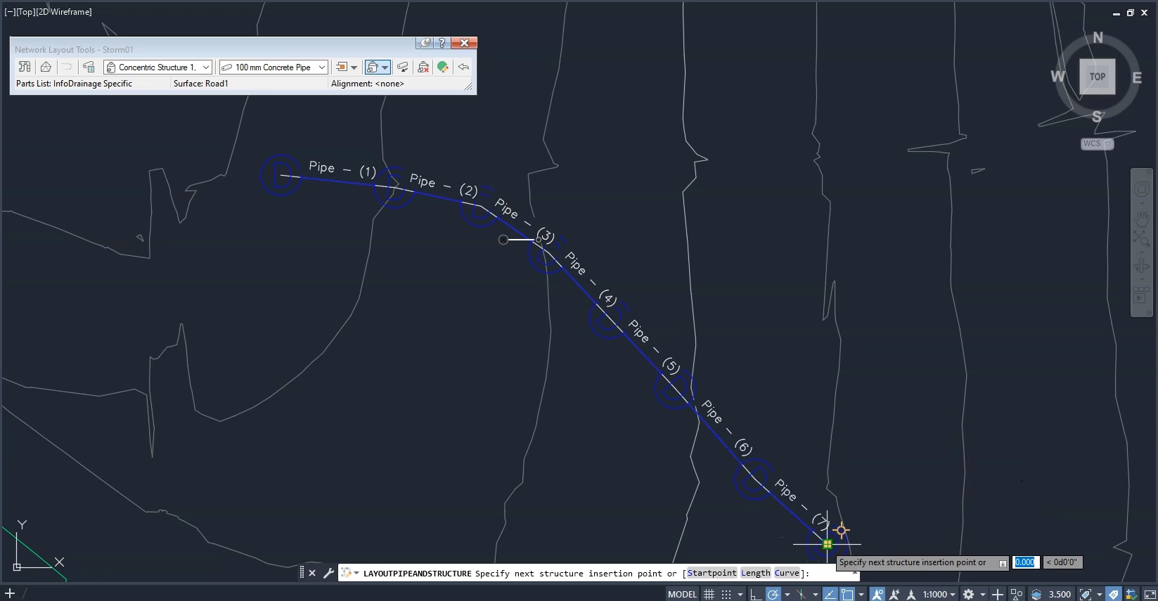 The completed pipe network highlighted blue in the Civil 3D drawing window, with all manholes selected and pipes labeled.