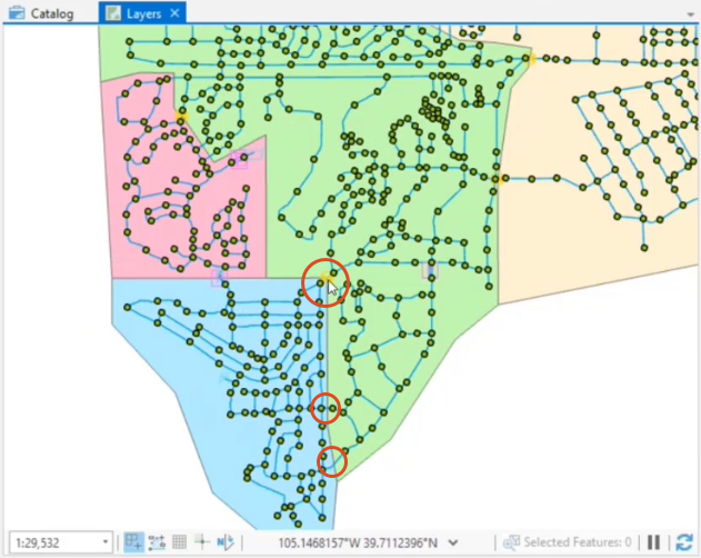 The Map View, showing the four pressure zones color-coded, with the three locations where pipes overlap between pressure zones 2 and 3 highlighted with red circles