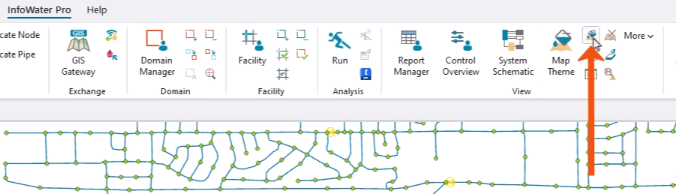 The InfoWater Pro tab, View panel, with Reset Map Theme being selected and called out with a red arrow.