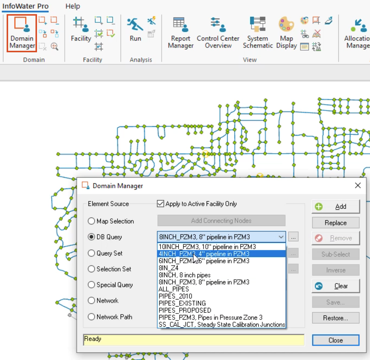 In the InfoWater Pro ribbon, Domain Manager highlighted in red, and in the Domain Manager dialog box, the DB Query drop-down expanded, with 4INCH_PZM3 selected.