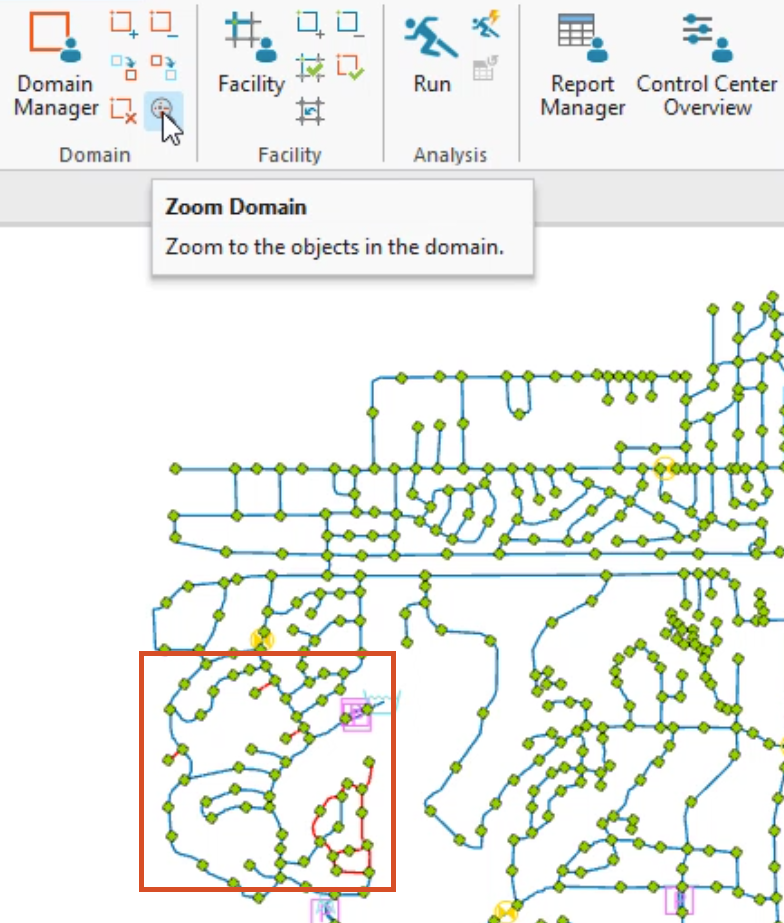 In the map view, the domain of 4-inch pipes highlighted in red, and in the ribbon, Domain panel, Zoom Domain selected.