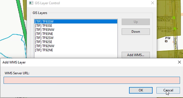 The GIS Layer Control dialog box, with the Add WMS Layer dialog box also open.