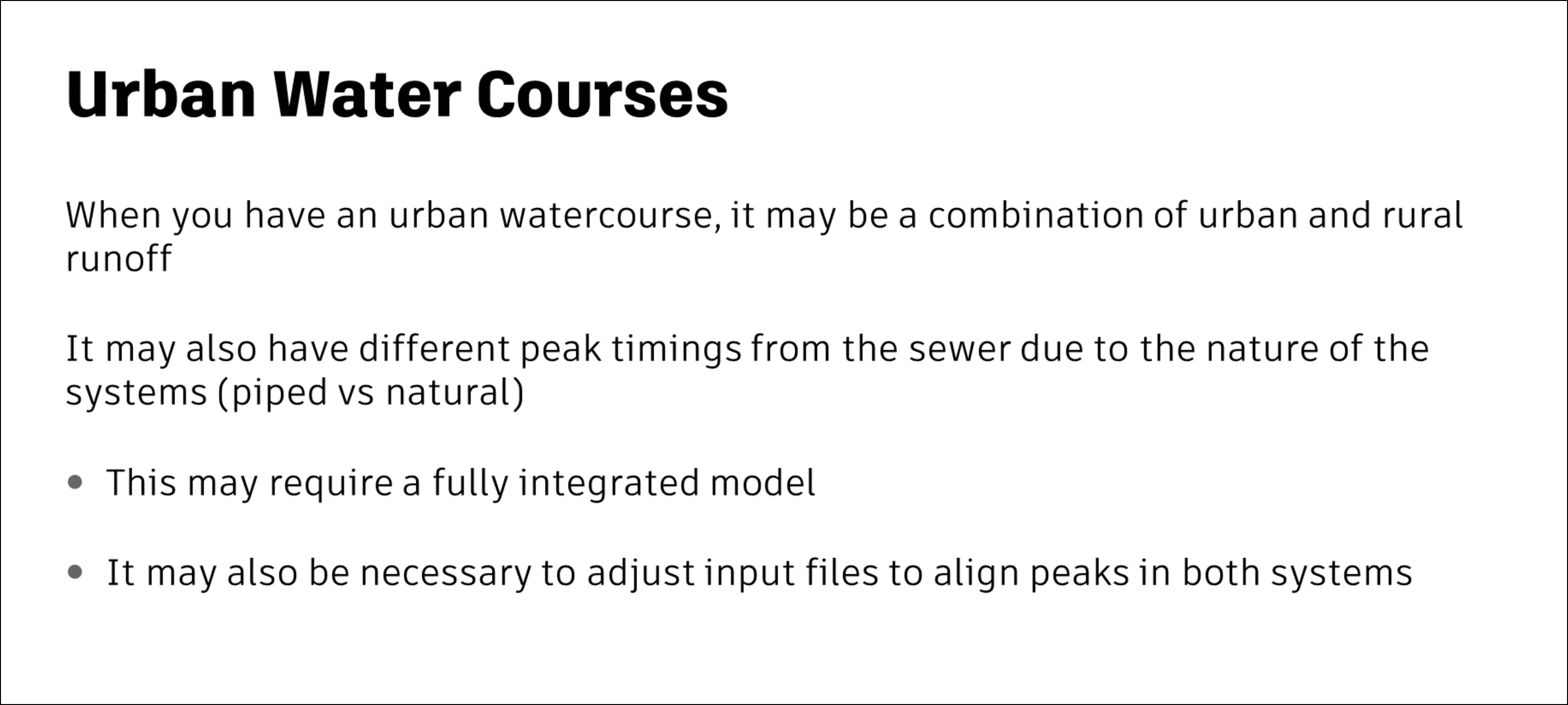 A presentation slide stating that urban water courses may require a fully integrated model, and that it may be necessary to adjust input files to align peaks from both systems.