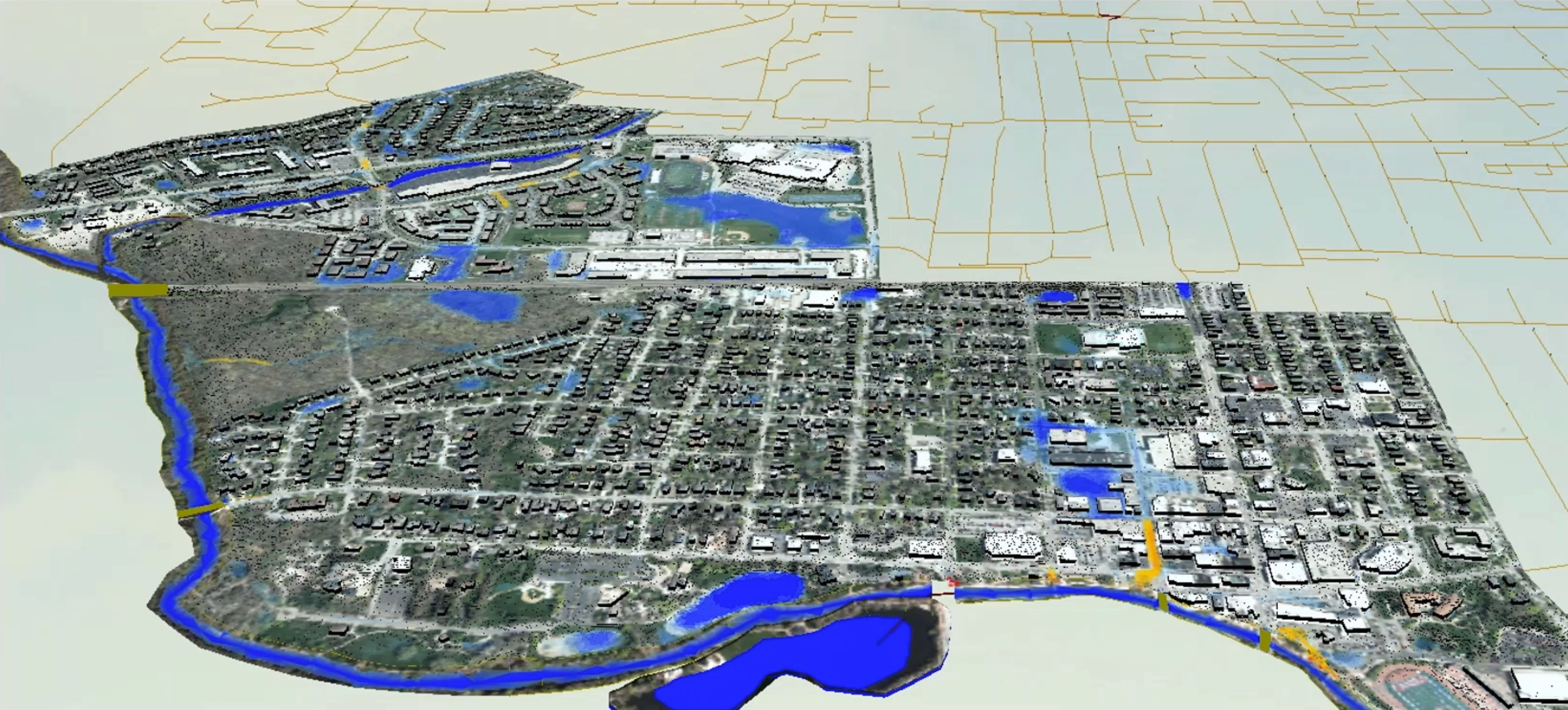 A 3D view of results with the flood theme active, showing buildings raised out of mesh and aerial photography or mapping.