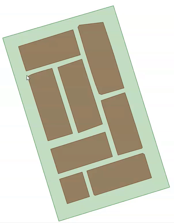 In an example model, polygons representing buildings appear as brown rectangles on a green background.