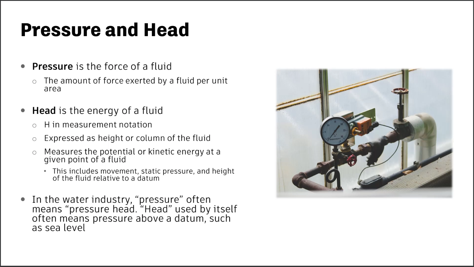 A presentation slide containing the definitions of pressure and head.