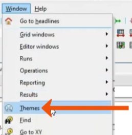 The Window menu expanded, with Themes being selected and called out with a red arrow.