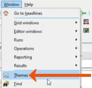 The Window menu expanded, with Themes being selected and called out with a red arrow.