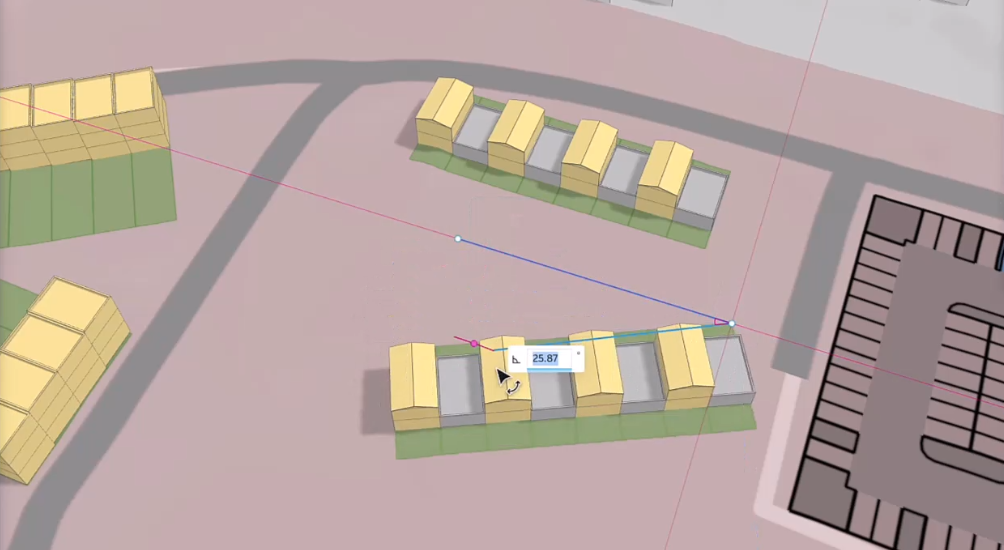 The new house and garage row houses being edited, so that each row now contains 4 houses and 4 garages. The original row has been copied, and the copied row is in the process of being placed at an angle from the original. Snap lines and angle values are guiding the placement.