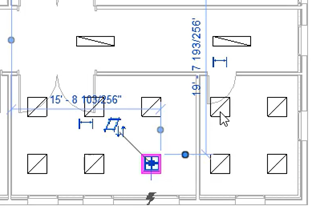 In the floor plan, in the room to the left of the four unassigned lighting fixtures, a lighting fixture selected.