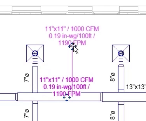 In the floor plan view, the new Duct Design Tag being repositioned to an empty area for better visibility.